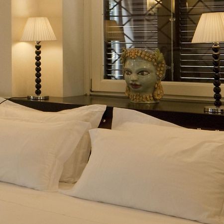 Villa Athena Resort أغريجنتو المظهر الخارجي الصورة A bedroom at the hotel