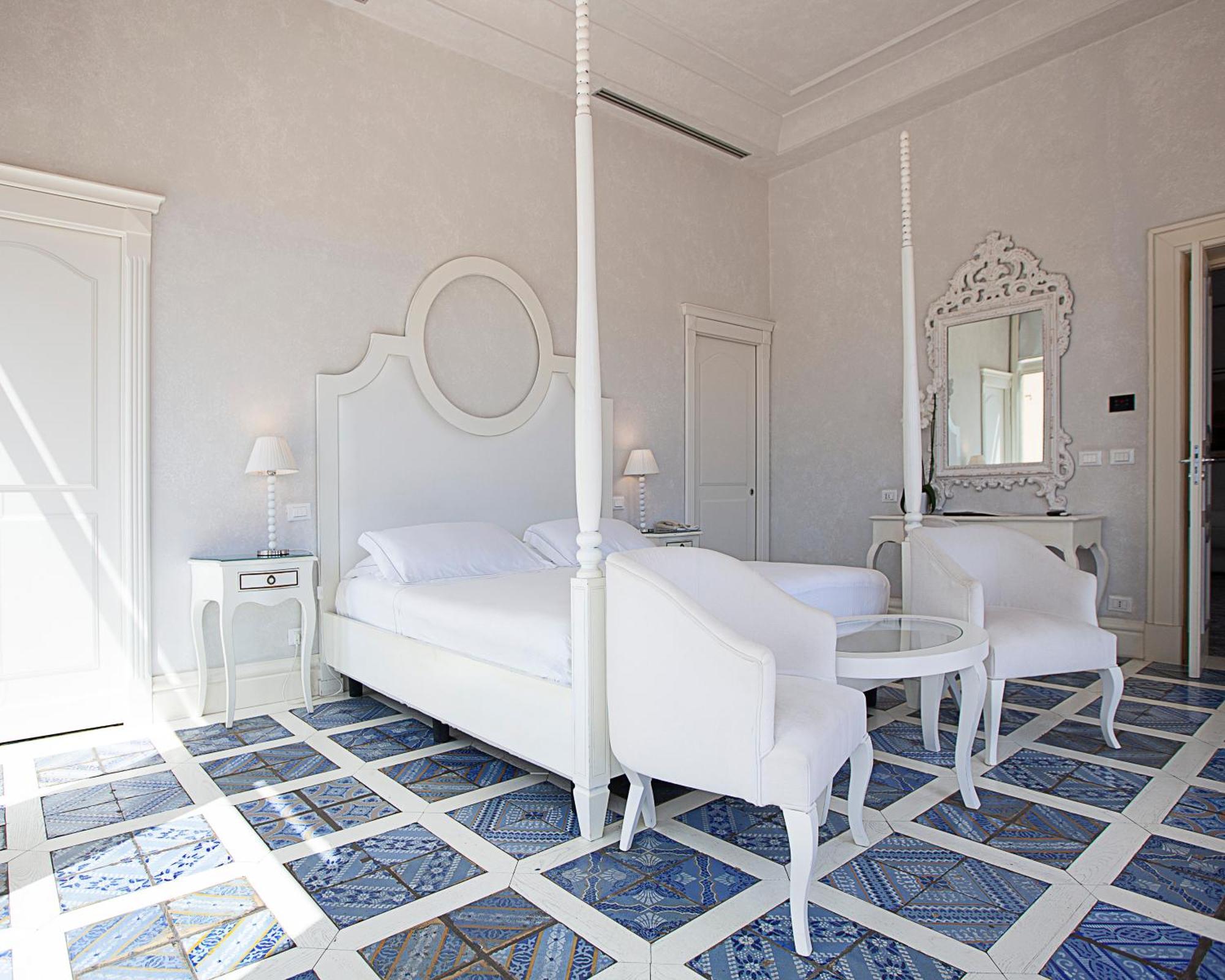 Villa Athena Resort أغريجنتو الغرفة الصورة A bedroom at the hotel