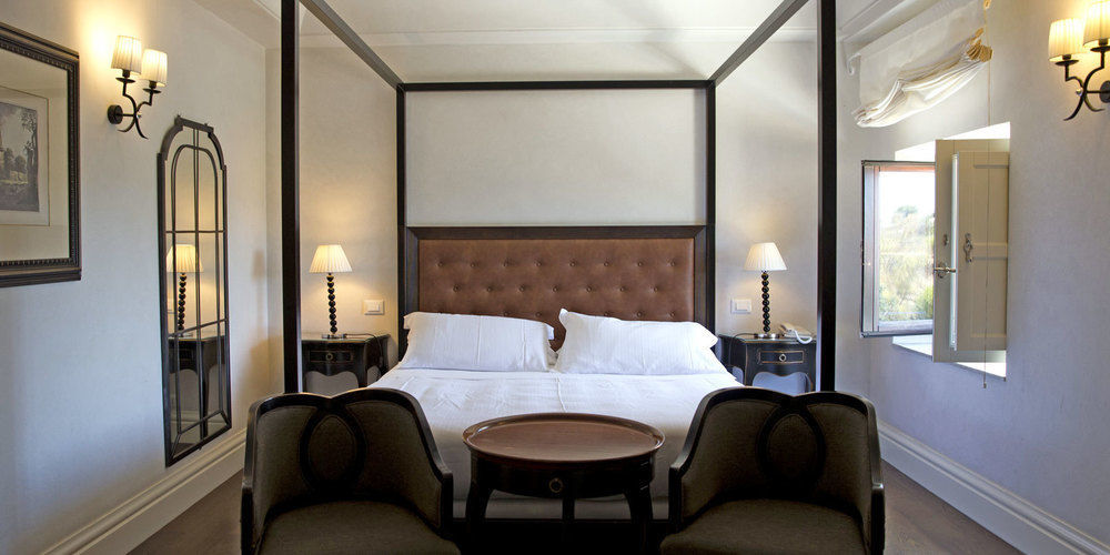 Villa Athena Resort أغريجنتو المظهر الخارجي الصورة A bedroom at the Hotel